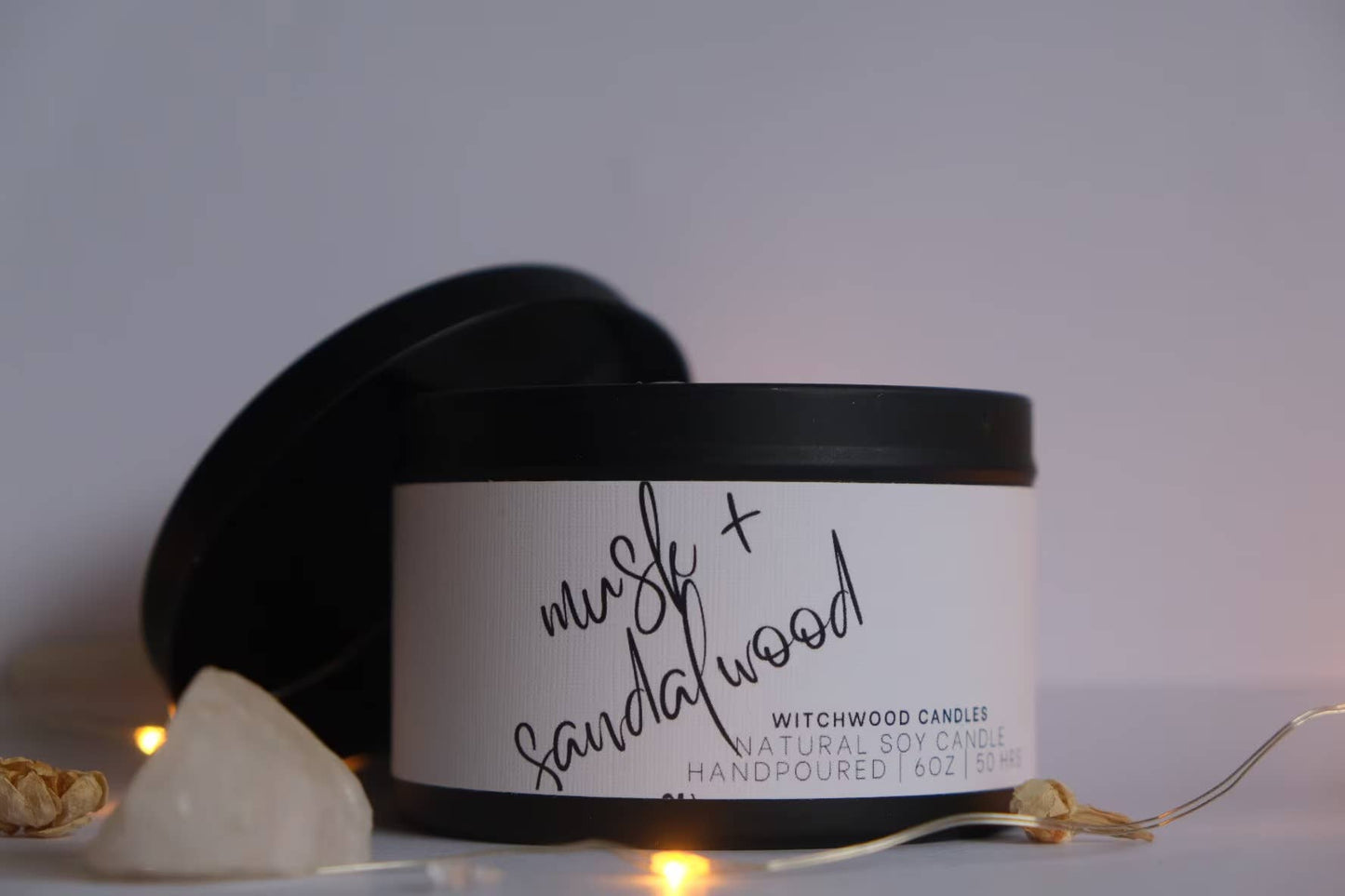 Musk and Sandalwood scented soy candle, matte black tin